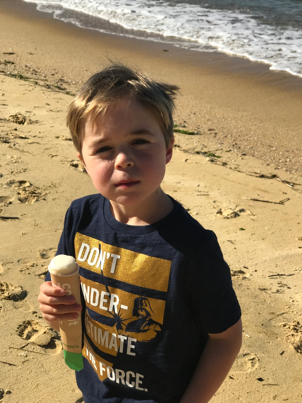 Coconut Juicies kid at beach