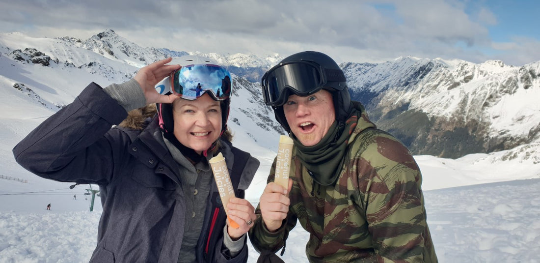 Managing Director Marina with Mr T on snow field holding Coconut Juicies