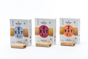 Zesti Organic Fruit Bars 3 packs with snack bars in front.