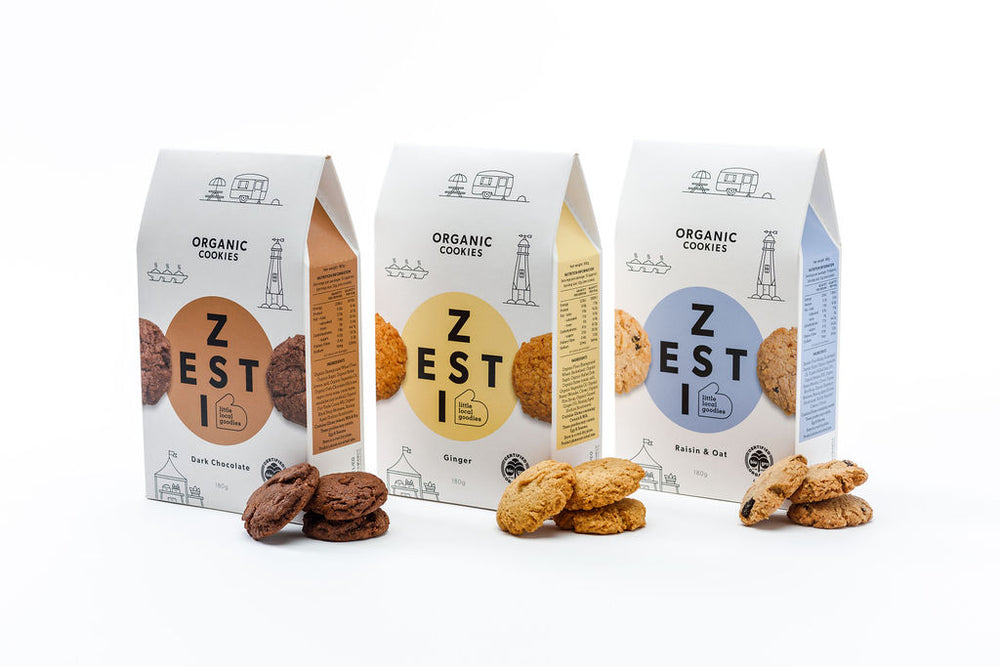 
            
                Load image into Gallery viewer, Zesti Organic Cookies 3 packs with cookies in front of packs.
            
        